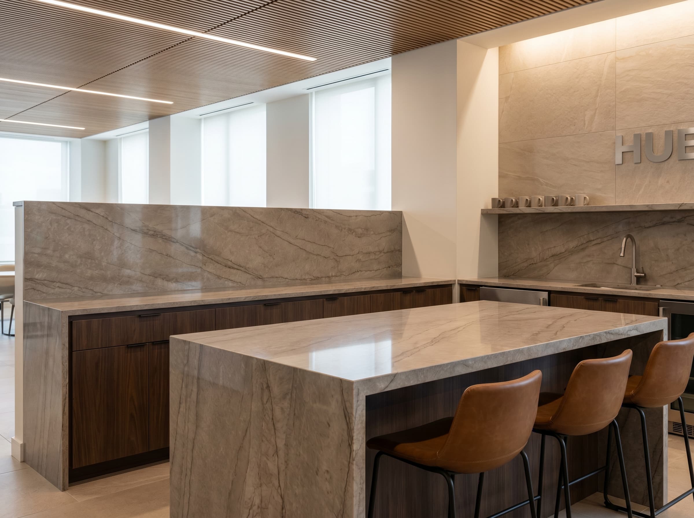 Commercial surface scope showing reception desk, breakroom counter, and coordinated tile splash