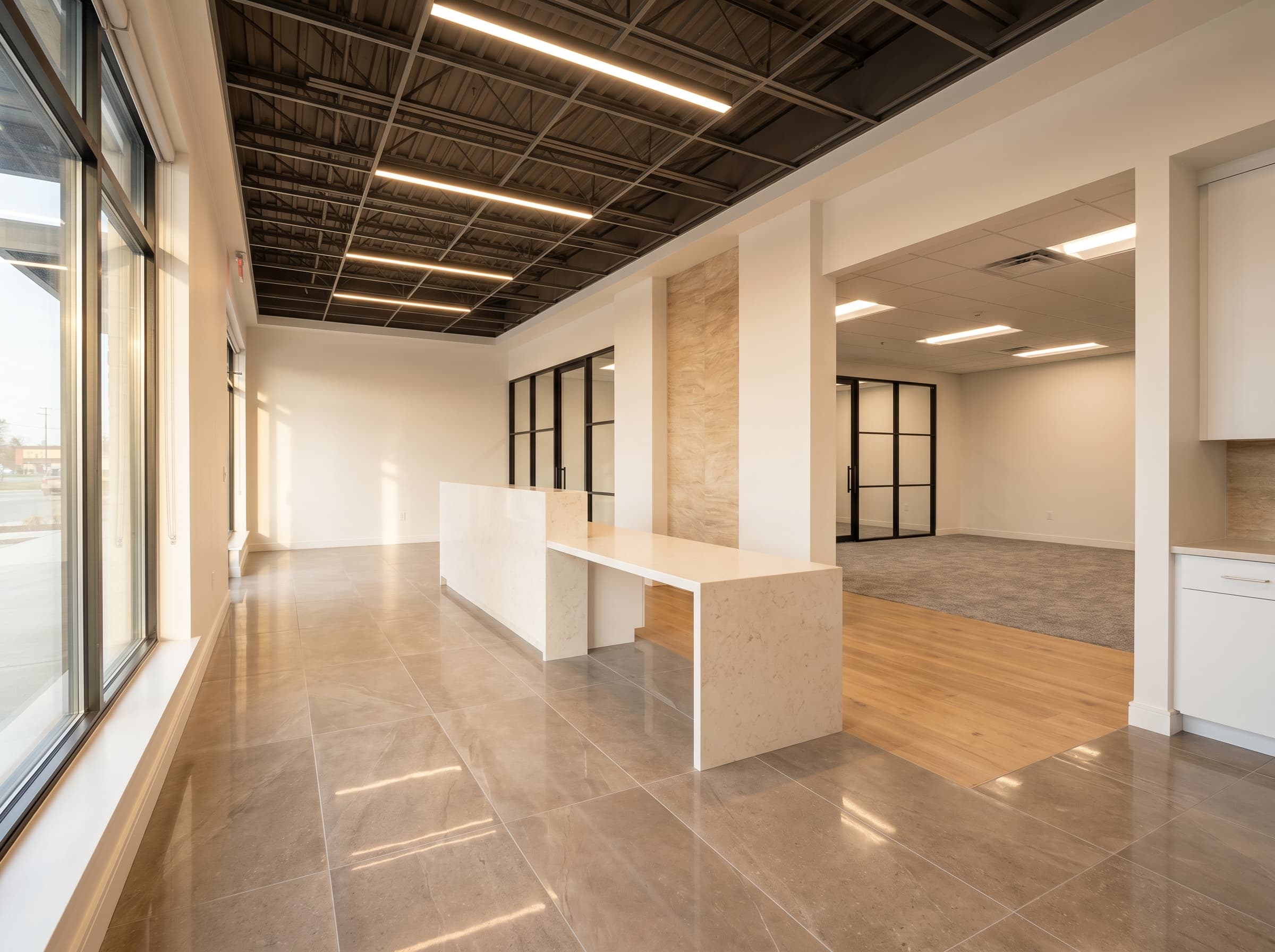 Tenant improvement scene with finished tile floor, coordinated surfaces, and clean handoff detail