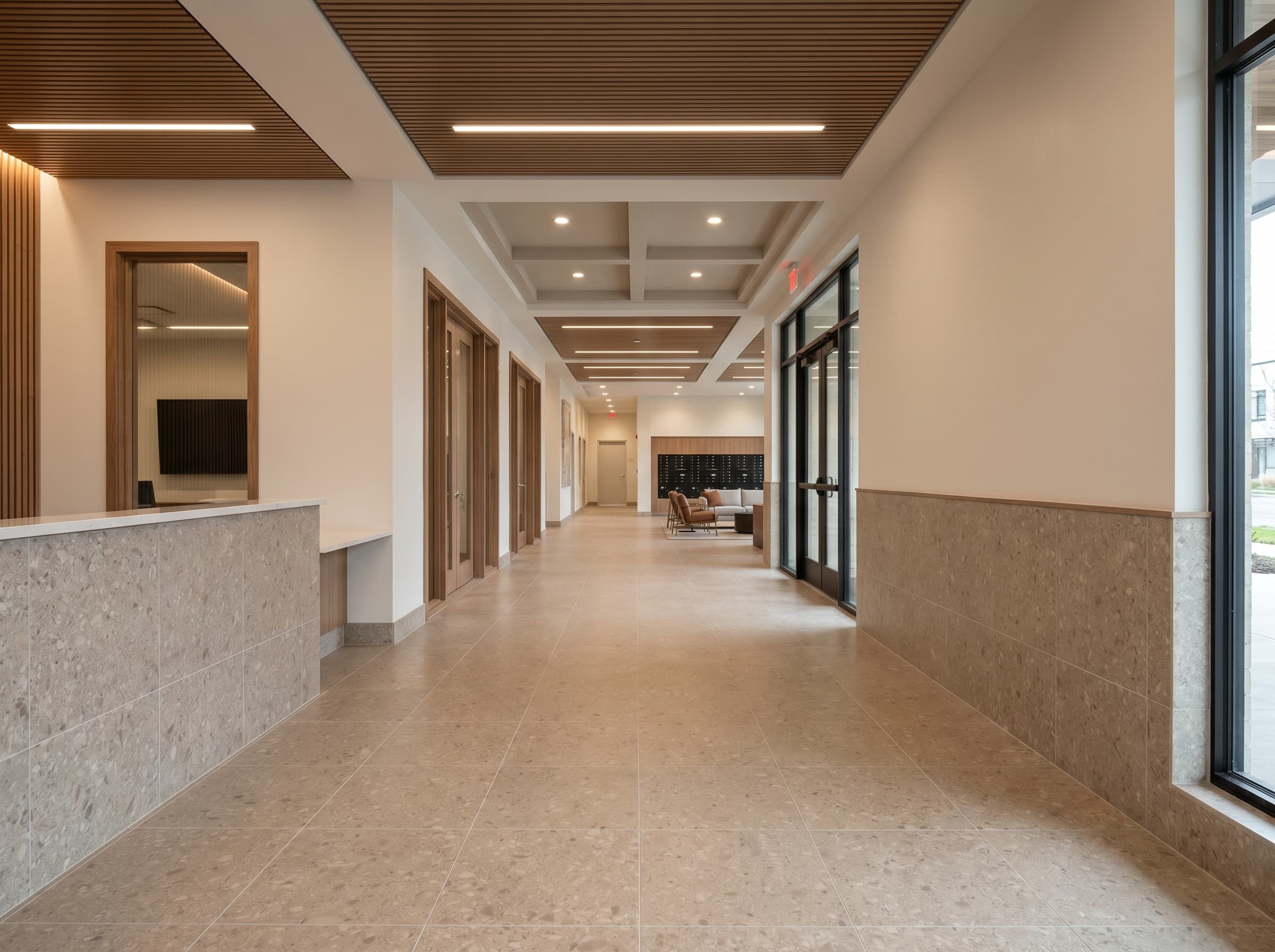 Commercial tile scope showing corridor flooring, amenity finish, and consistent installation across phases